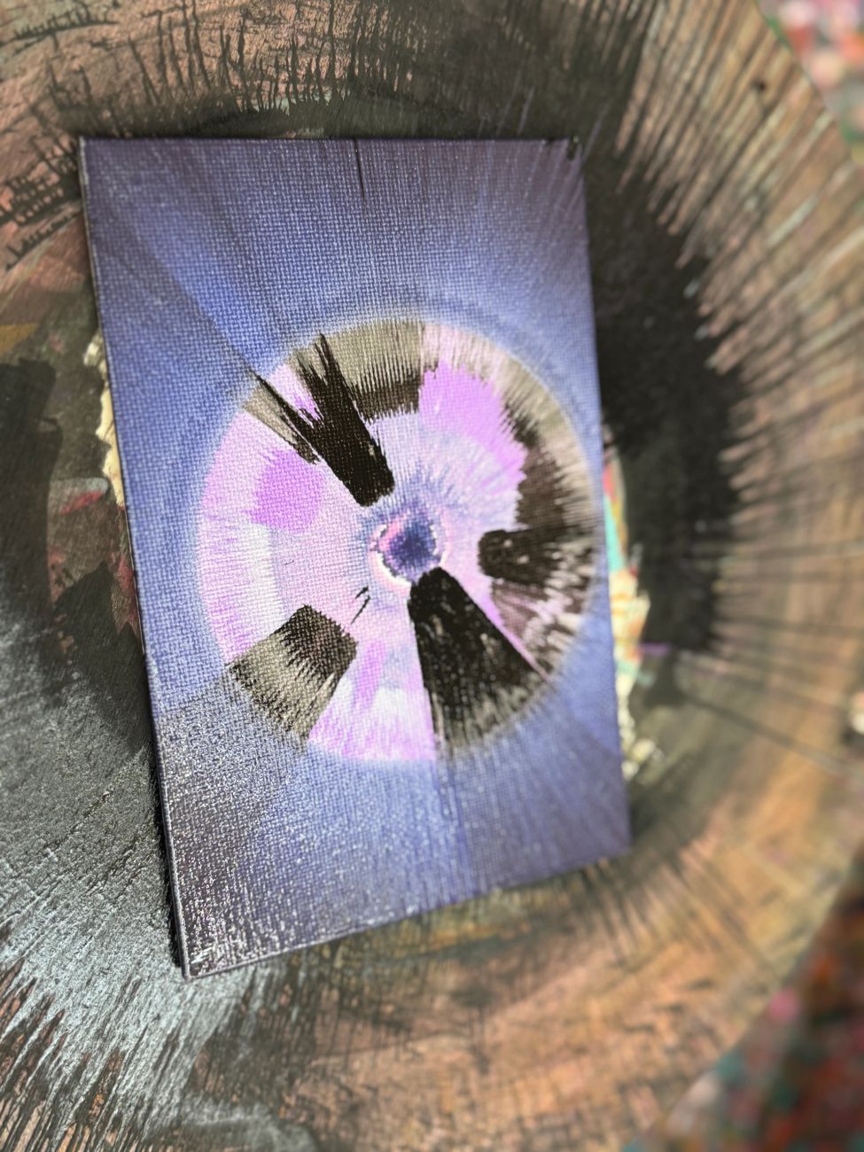 Handprint art on a colorful canvas