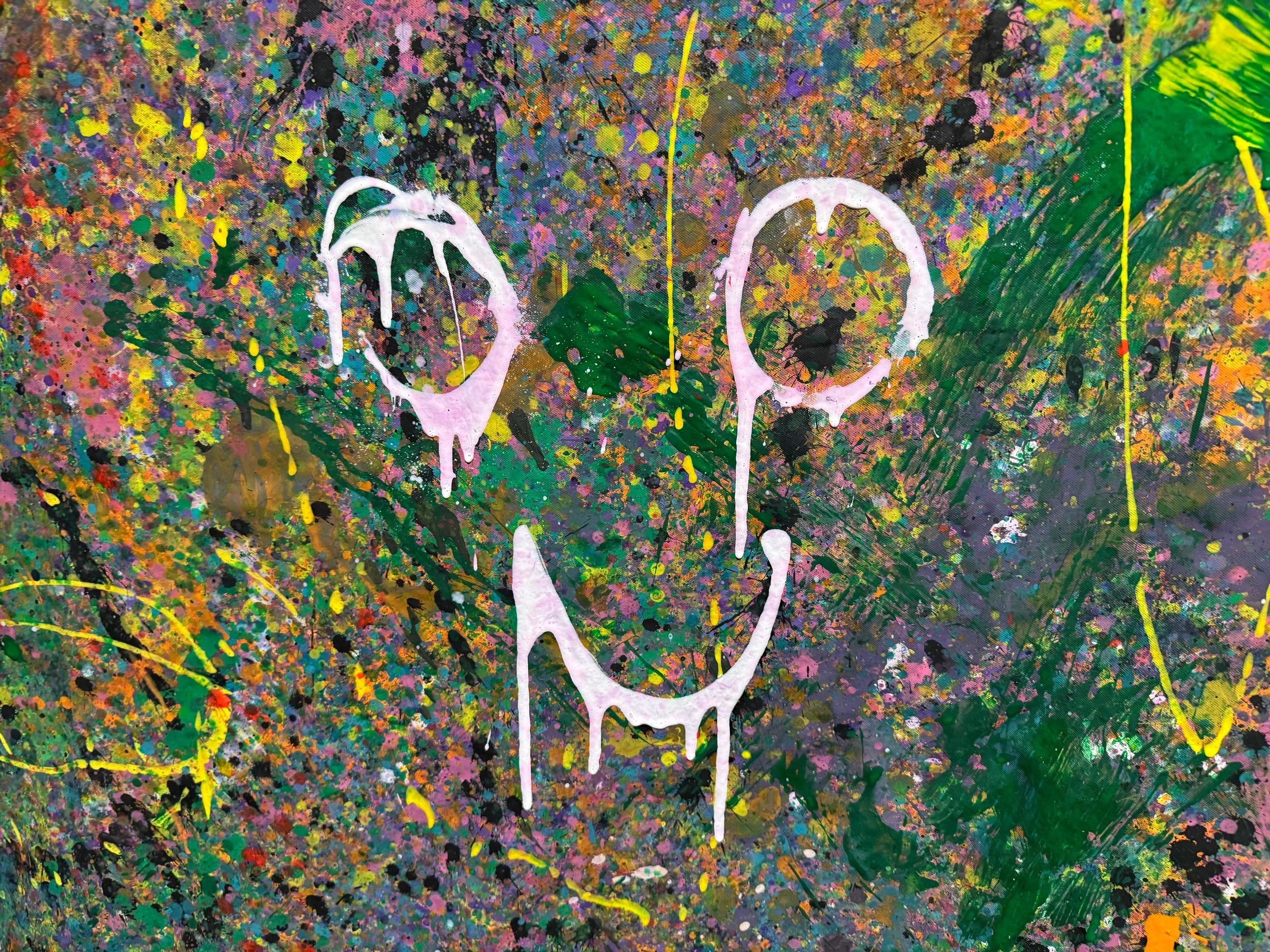 A smile made from splashes of paint